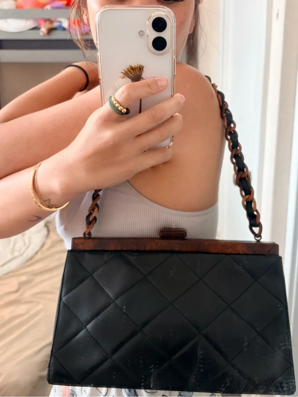 CHANEL Black Quilted Leather Shoulder Bag with Brown Chain